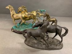 Two sculptures of equestrian groups and one brass rearing horse