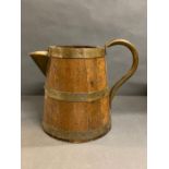 An oak and brass bound jug/pitcher