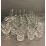 A selection of cut glass, including flutes, couples etc