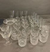A selection of cut glass, including flutes, couples etc