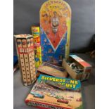 A selection of vintage children's games including pinball etc