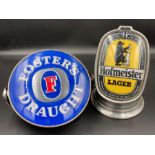 Breweriana: Two contemporary pub pump heads Fosters and Hofmeister