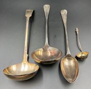 Two large plated ladles, serving spoon and a small sugar sifter.