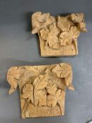 Two carved wooden plaques (H24cm W28cm)