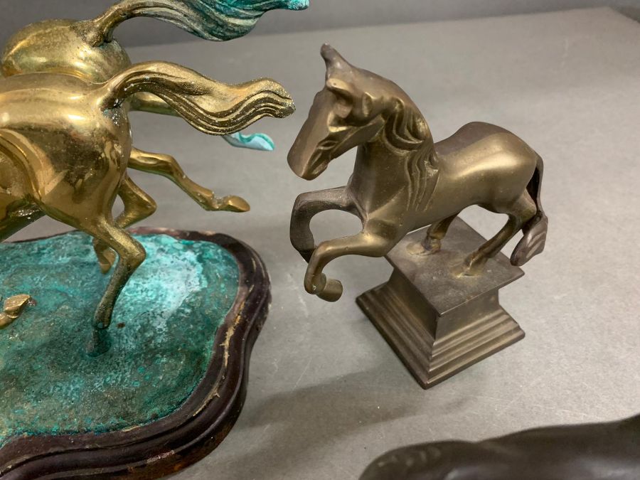 Two sculptures of equestrian groups and one brass rearing horse - Image 5 of 7