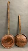 Two copper bed pans