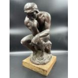 A Plaster statue in the manner of the thinker