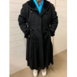 A black wool overcoat with velvet and cord cuffs by Harella size Uk 12