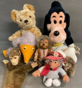 A selection of soft children's toys to include wombler characters, monkey hand puppet and softy