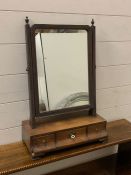 A table top dressing table mirror with drawers to base