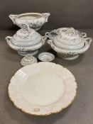 Two lidded tureens, one larger with lid, three china coaster "Unique" and one white and gold dish "