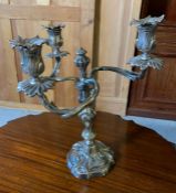 A three armed silver plated candlestick