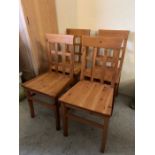 Four lattice back pine chairs