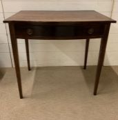 A Bow fronted mahogany hall table on tapered legs (80cm x 54cmx 78cm)