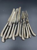 A set of silver knives and forks (Approximate weight 399g) AF