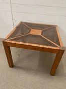 A Russian pine square table with cane and glass top (H48cm Sq66cm)