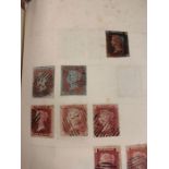 An album of stamps including a selection of Victorian penny reds and one penny black and other