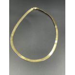 A 14ct gold necklace (Total Weight 13.5g)