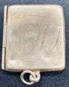 A silver stamp envelope, hallmarked for Chester 1924.