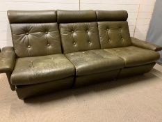 A three seater modular vintage button back sofa