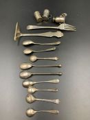 A small selection of silver curios, mustard spoons etc.