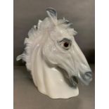 A galloping china horse head sculpture (50cm x 51cm)