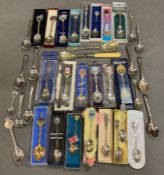 A Collection of spoons including some silver.