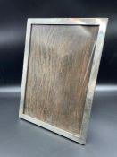 A Large silver picture frame (Approx 25.5 x 18.5 cm) hallmarked for Birmingham.