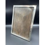 A Large silver picture frame (Approx 25.5 x 18.5 cm) hallmarked for Birmingham.