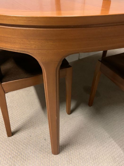 A Mid Century dining table with centre leaf and four chairs by Nathan - Image 3 of 4