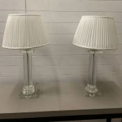 A pair of glass column table lamps