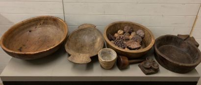 A selection of seven wooden rustic pans, dough bowls decorative items
