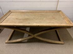 Two light oak X framed side tables (111cm x 58cm x 44cm and 60cm x 59cm x 40cm)