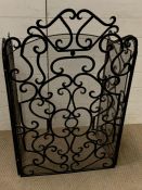 A Wrought iron firescreen