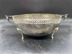 A Two handled bowl by WB & Son Ltd with a hammered design, London 1933