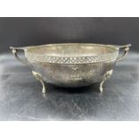 A Two handled bowl by WB & Son Ltd with a hammered design, London 1933