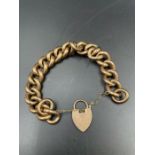 A 9ct gold bracelet with heart shaped fastener, total weight 26.2g