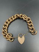 A 9ct gold bracelet with heart shaped fastener, total weight 26.2g