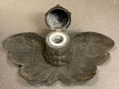 A brass owl inkwell