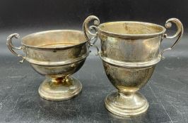//Two silver handled cups by Alexander Clark & Co Ltd (170g) Birmingham 1929