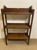 An oak three tier open book case with club cut out to back (H89cm W56cm D20cm)