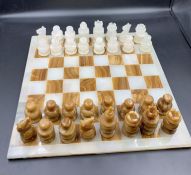 A Marble Chess set in original wooden carry case