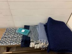 A selection of throws, blankets and cushion covers