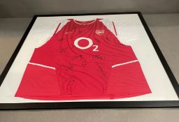 A signed Arsenal shirt to include Campbell, Dixon, Keown, Pires, Henry, Ian Wright, Adams etc (See