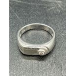 A Gents Platinum and diamond contemporary ring (Total Weight 9.5g)