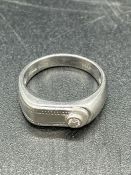A Gents Platinum and diamond contemporary ring (Total Weight 9.5g)