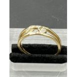 A 15ct gold and diamond ring (Total weight 3.1g)