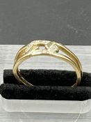 A 15ct gold and diamond ring (Total weight 3.1g)