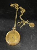 An 18ct gold pocket watch AF and Albert Chain (Please note that the fastener on the bottom of the