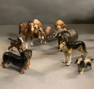 A selection of china animals by Beswick, Sylvac, including dogs, horses and elephant